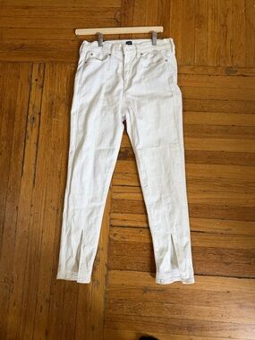 Gap high-rise skinny jeans featuring side slits at the hem.